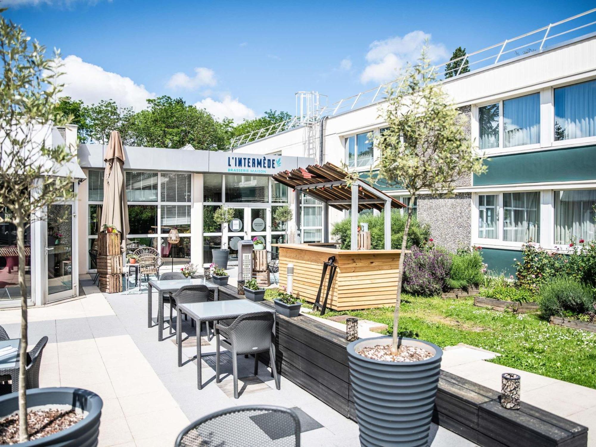 Hotel Novotel Evry Courcouronnes Bagian luar foto